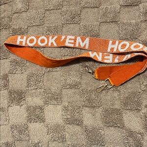 Orange Hook 'Em stadium bag strap